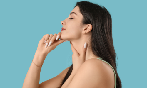 Woman practicing face yoga